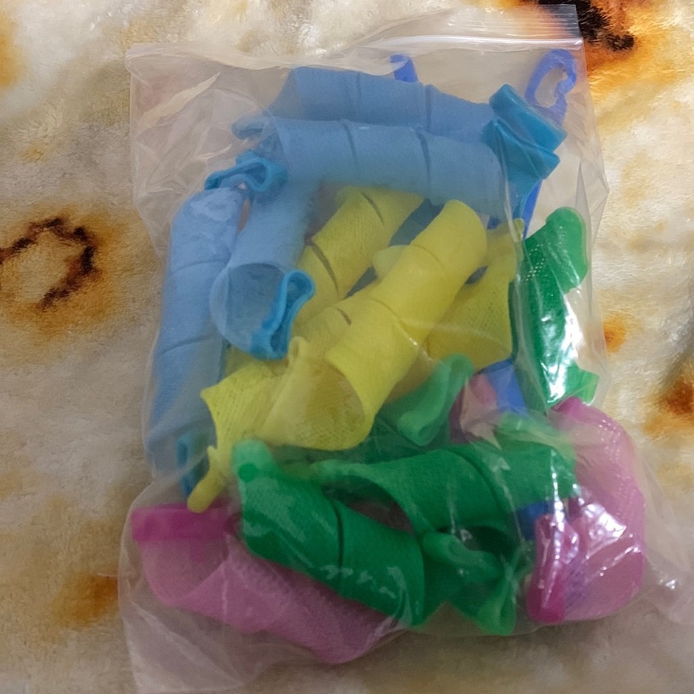 Pull through curl twist tubes